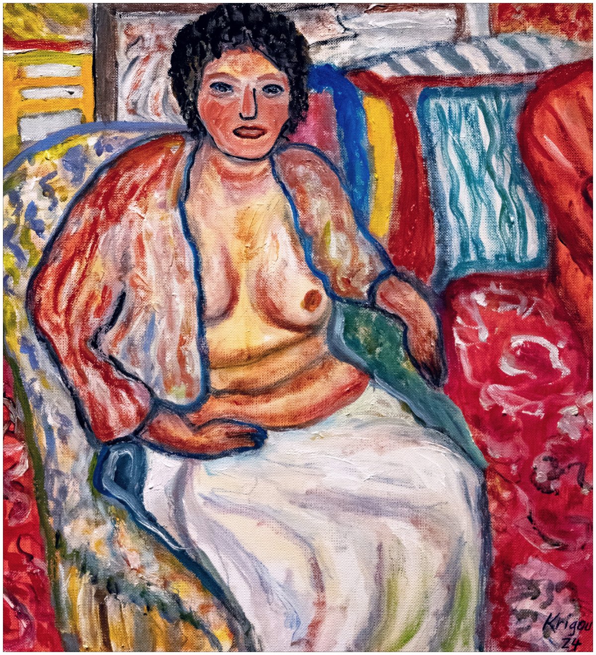 Femme mature assise dans son fauteuil