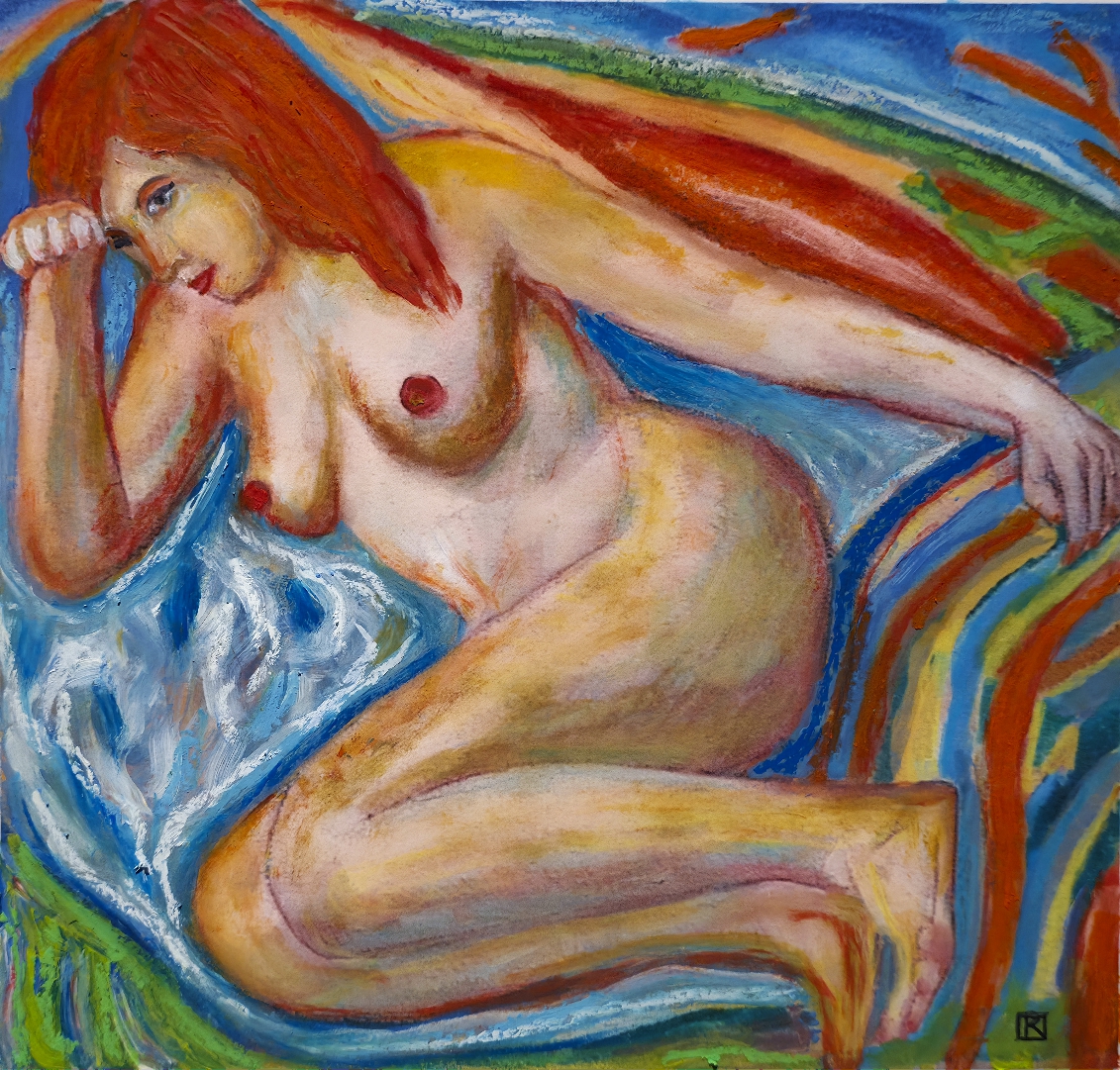 Rousse nue sur un linge de bain
