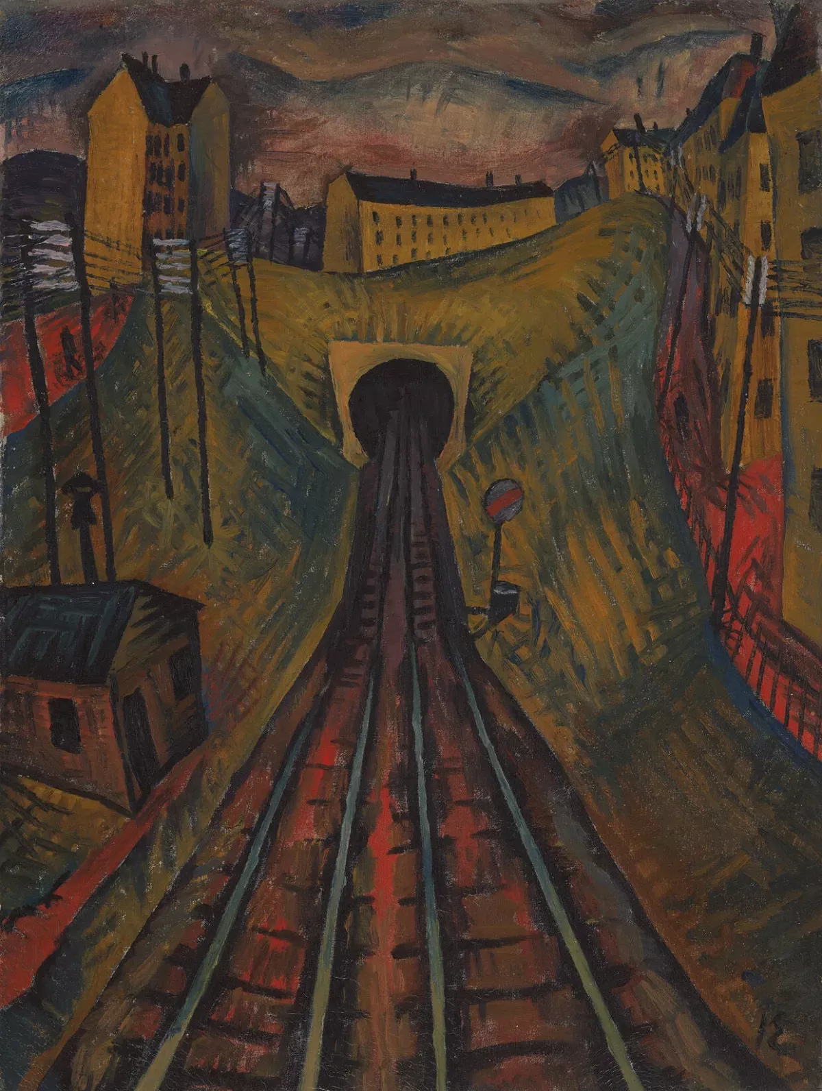 Tunnel ferroviaire et usines à l'arrière