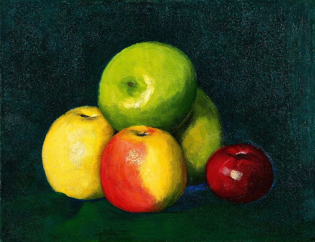 Pommes sur tissu vert