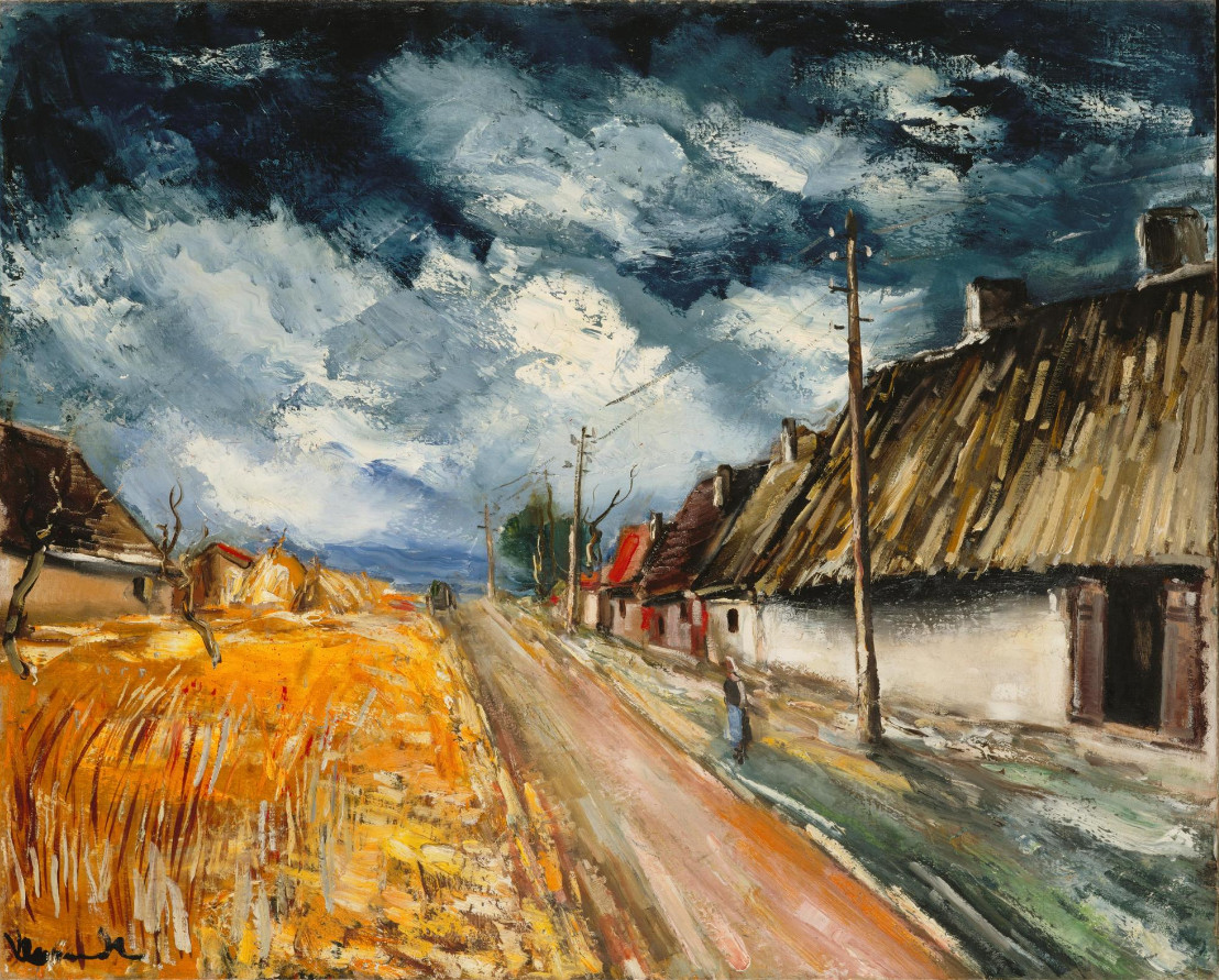 Cottages de chaume au bord de la route